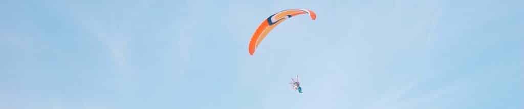paraglider in the open sky