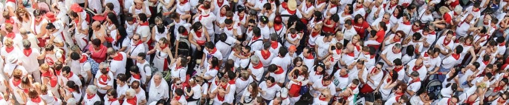 a large group of people waiting together