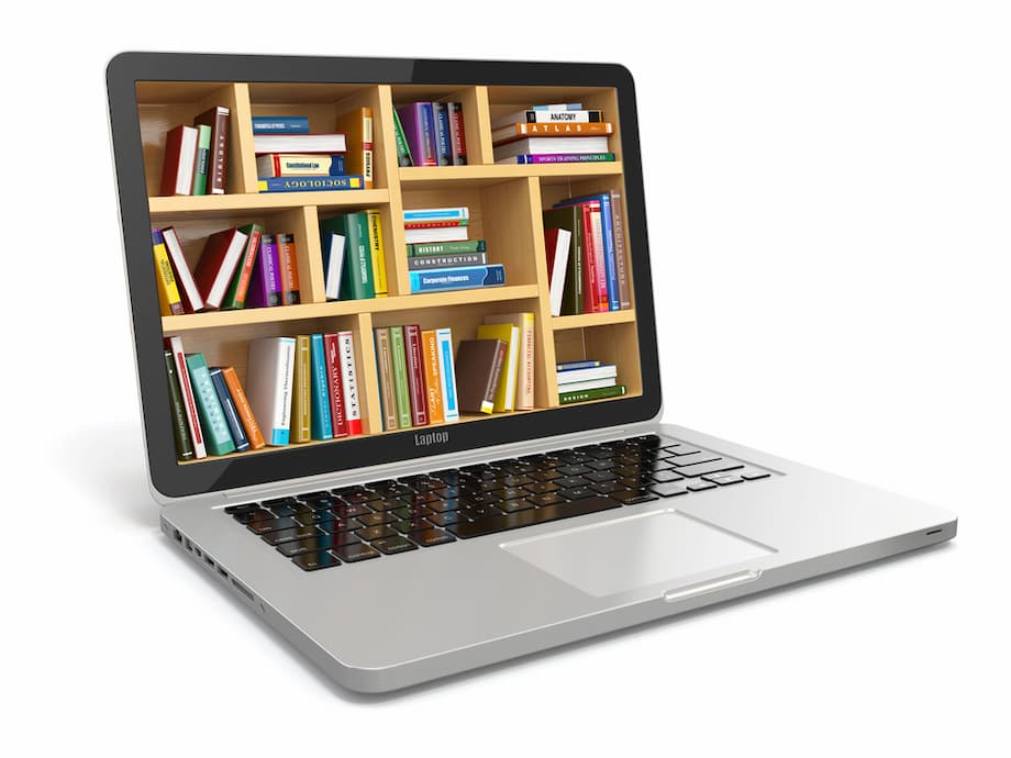 E-learning education or internet library. Laptop and books.